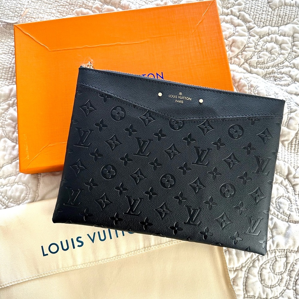 Fashion designer inspired pouch bag